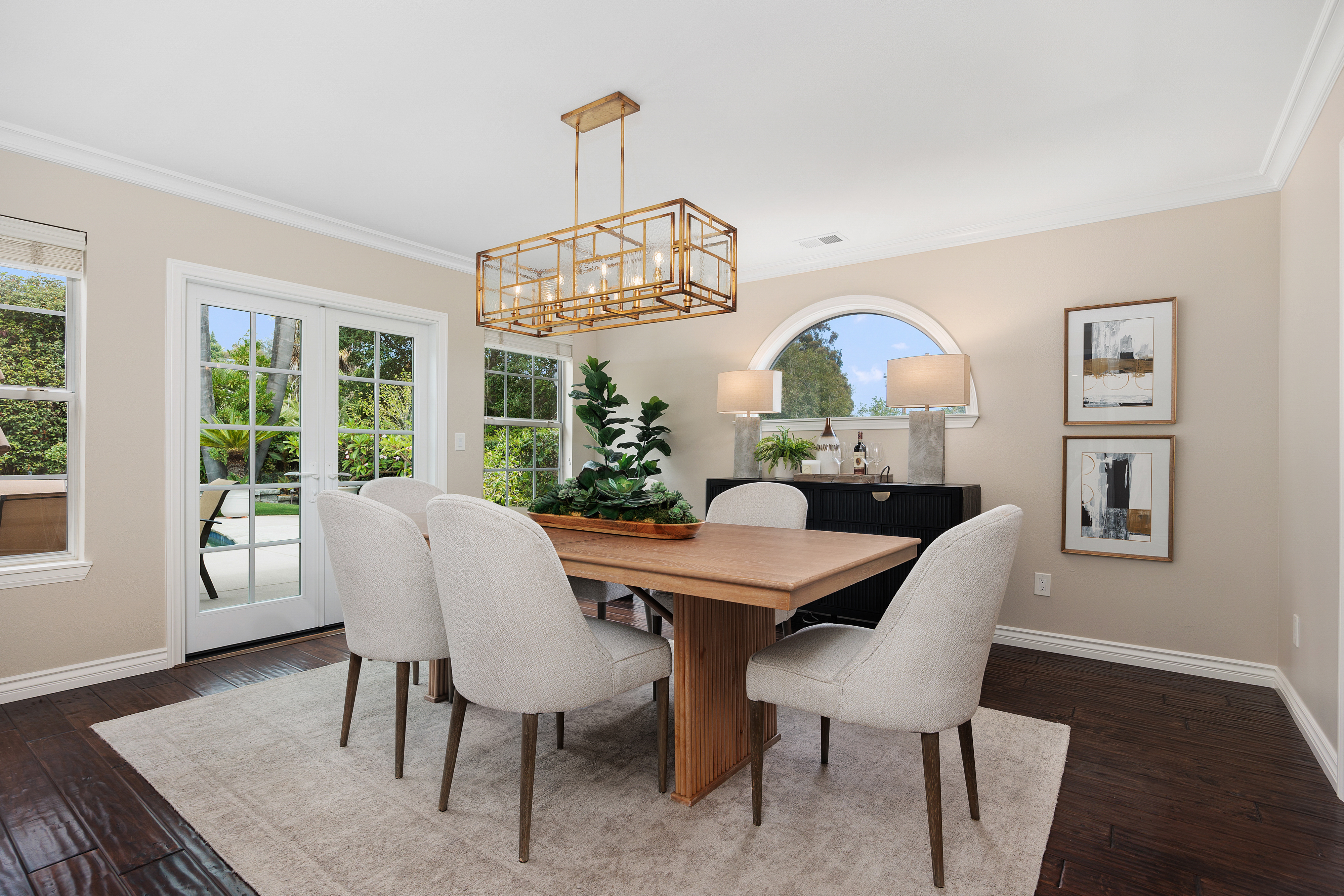 Home staging Encinitas dining room gold pendant chandelier