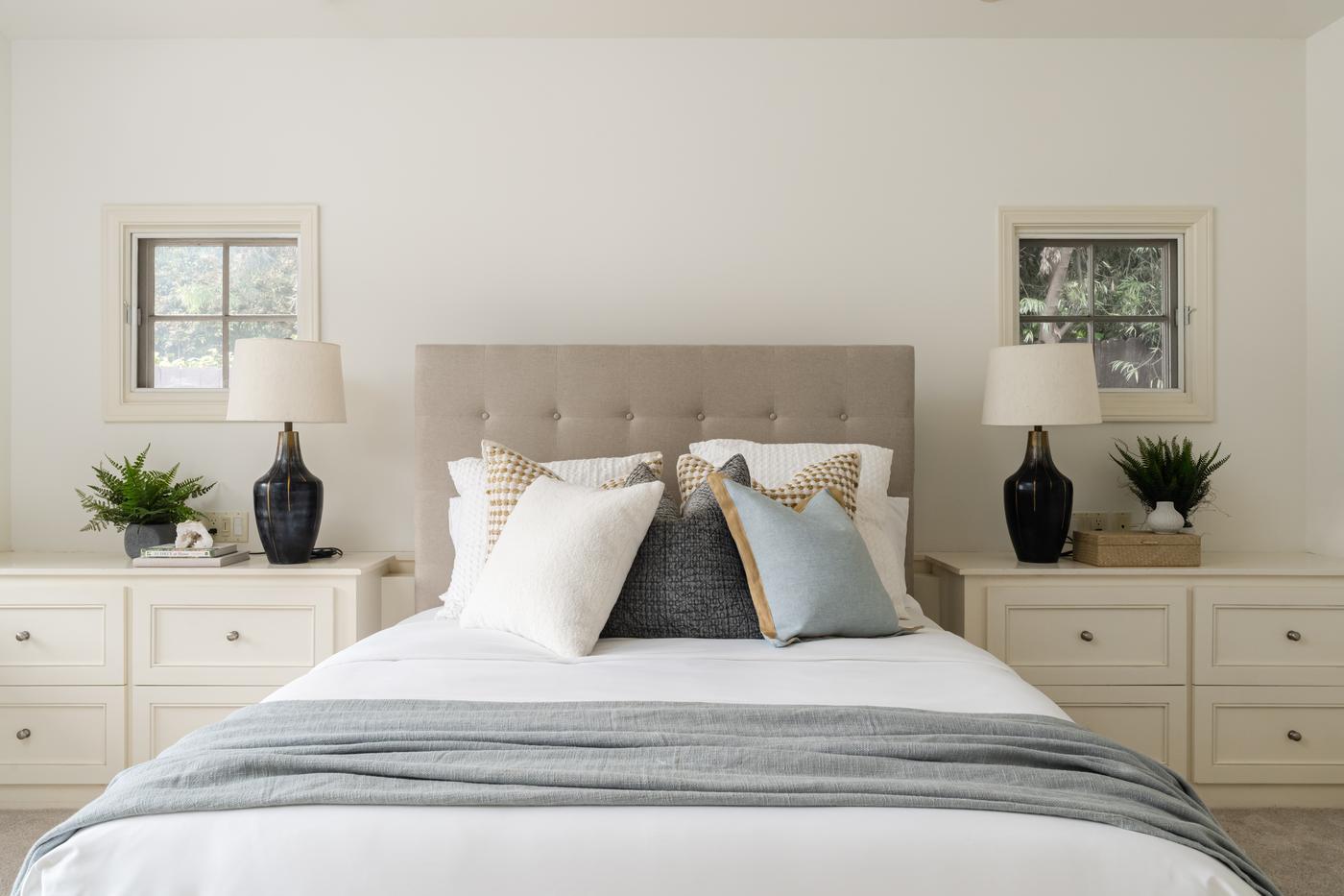 La Jolla staged bedroom tufted headboard