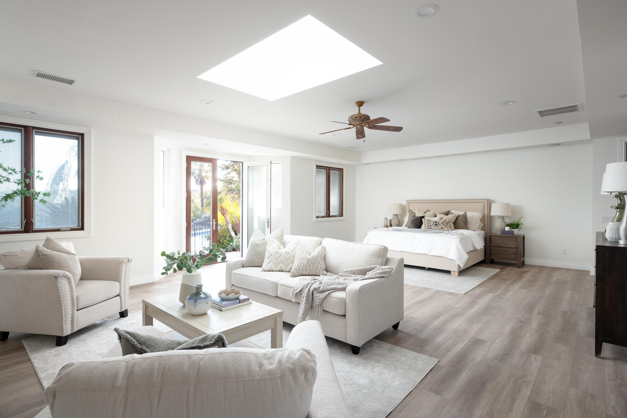 Primary suite with sitting area vacant staging Poway