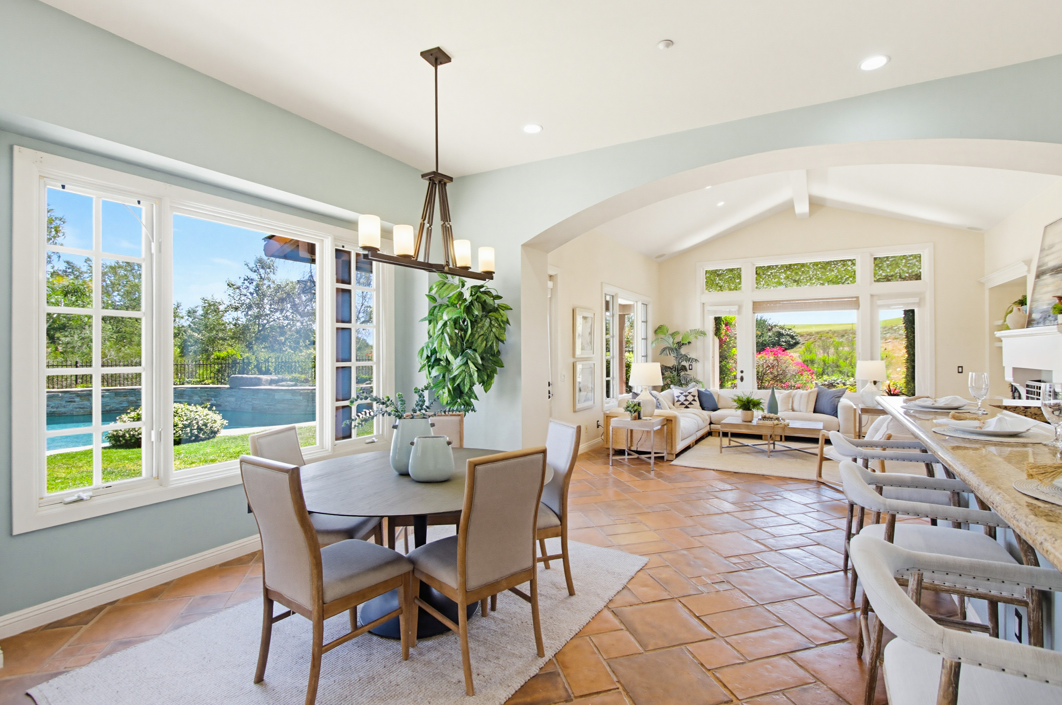 Staged kitchen dining room terracotta floors Santaluz San Diego